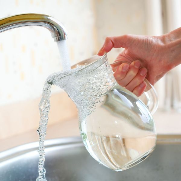 image of a water pitcher being filled